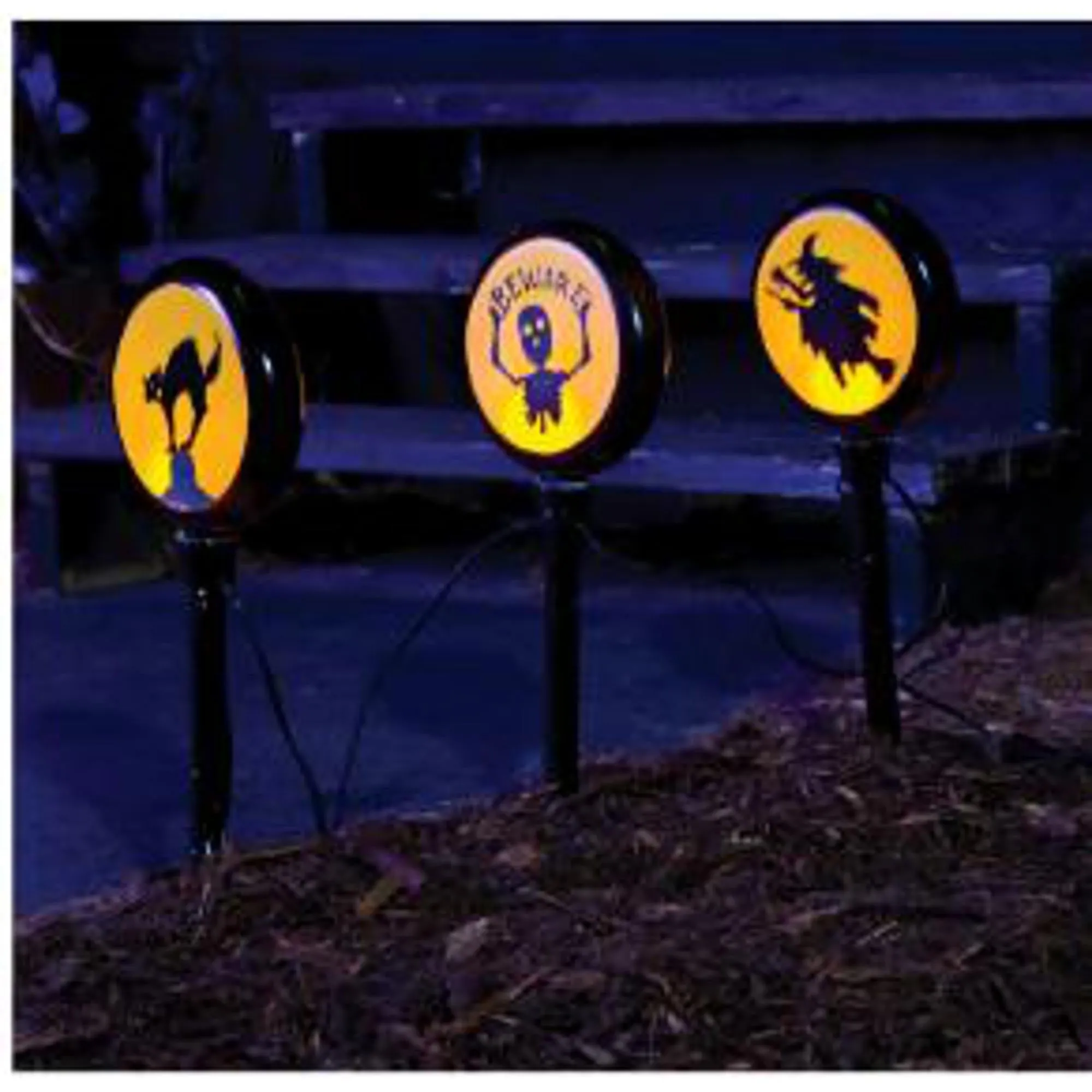 "Solar-Powered Path Marker Silhouettes"